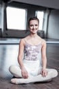 Joyful nice ballet dancer smiling to you Royalty Free Stock Photo