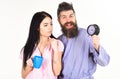 Perfect morning concept. Couple, family woke up on time. Couple in love, young family in pajama, bathrobe stand isolated Royalty Free Stock Photo