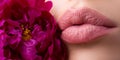 Perfect natural lip makeup. Lips with lipstick closeup. Beautiful woman lips with flowers. Royalty Free Stock Photo