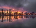 Perfect nature reflection on beautiful trees with colorful sky at sunrise Royalty Free Stock Photo