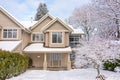 A perfect neighborhood. Entrance of nice residential house in snow Royalty Free Stock Photo