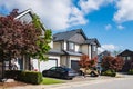 A perfect neighborhood. Houses in suburb at summer in the north America. Real Estate Exterior Front House on a sunny day Royalty Free Stock Photo