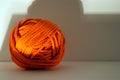 Perfect orange clew ball or ball of wool Royalty Free Stock Photo