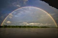 Perfect panoramic view of a complete rainbow over the river Huallaga / Amazonas in Peru Royalty Free Stock Photo