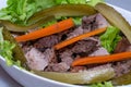 a perfect pork steak with pickled carrots and pickled cucumbers Royalty Free Stock Photo