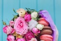 Perfect present, flower composition with macaroons in craft box