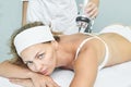 Perfect radio treatment. Woman at spa procedure. Doctor hand and girl body. RF cosmetology lifting. Back body Royalty Free Stock Photo