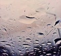 Perfect rain drops on the glass of the car