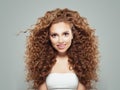 Perfect redhead girl with long healthy curly hair. Hair care concept Royalty Free Stock Photo