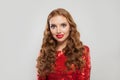 Perfect redhead woman model with curly hair and red lips makeup on white background