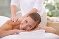 This is perfect relaxation. A young woman on a massage table in a spa.