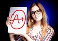 Perfect school grade A plus of exam and happy girl Royalty Free Stock Photo