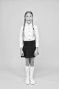 Perfect schoolgirl. Small schoolgirl with happy smile. Little schoolgirl looking nice in school uniform. Cute schoolgirl