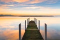 Perfect serenity - timber jetty and mirror reflections