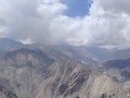 A perfect shot of the hills of spiti Valley with clouds shining perfectly over them Royalty Free Stock Photo