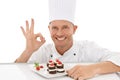 Perfect, sign and dessert chef happy with dish or sweet chocolate flavor with hand gesture isolated in studio white Royalty Free Stock Photo