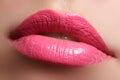 Perfect smile. Beautiful full pink lips and white teeth. Pink lipstick. Gloss lips. Make-up & Cosmetics Royalty Free Stock Photo