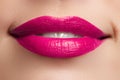 Perfect smile. Beautiful full pink lips and white teeth. Pink lipstick. Gloss lips. Make-up & Cosmetics Royalty Free Stock Photo