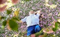 Perfect spring day. thinking about youth in park or garden. happy man under spring sakura blossom. senior man looking up Royalty Free Stock Photo