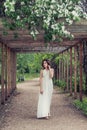 Perfect spring woman in white dress outdoors portrait, romantic walk