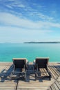 Perfect summer tropical paradise beach with lounge chairs at resort in Phuket, Thailand. Vacation summer holidays and travel Royalty Free Stock Photo