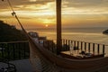 Perfect Sunset over the Caribbean Sea from the balcony with a hammock in the touristic village of Taganga near Santa Marta, 2020