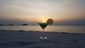 Perfect sunset on top of the mocktail served in martini glass at the whitesand beach