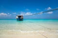 Perfect tropical island paradise beach and old boat Royalty Free Stock Photo