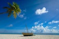 Perfect tropical island paradise beach and old boat Royalty Free Stock Photo