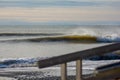 Perfect wave on a sunny day with foreground background bohkeh