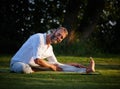 The perfect way to end a day. a mature man doing yoga in a sitting position in the outdoors. Royalty Free Stock Photo