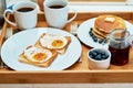 The perfect way to start the day. Still life shot of breakfast on a tray. Royalty Free Stock Photo
