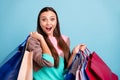 Perfect weekend concept. Close-up photo portrait of funny funky lady holding many colorful bags in hands looking in Royalty Free Stock Photo