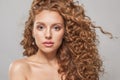 Perfect young redhead woman with long healthy wavy red hair. Natural beauty without retouching. Beautiful curly hair female model Royalty Free Stock Photo