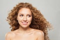 Perfect young woman redhead fashion model with long natural healthy brown curly hair and cute smile looking aside Royalty Free Stock Photo