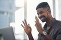 Perfection is exactly what I strive for. a young businessman making an okay sign during a video call on a laptop in an Royalty Free Stock Photo