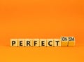 Perfectionism symbol. Concept words Perfect or Perfectionism beautiful wooden blocks. Beautiful orange table orange background.