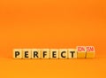 Perfectionism symbol. Concept words Perfect or Perfectionism beautiful wooden blocks. Beautiful orange table orange background.