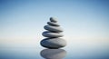 Perfectly balanced stone cairn against blue sky Royalty Free Stock Photo