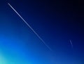 Perfectly blue sky with planes and vapor trail Royalty Free Stock Photo
