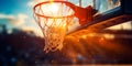 Perfectly captured moment of a basketball swishing through the hoop midair. Concept Sports, Basketball, Action Shot, Precision, Royalty Free Stock Photo