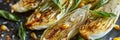 Perfectly caramelized and infused with a medley of es this grilled endive is a musttry Royalty Free Stock Photo