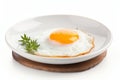 Perfectly cooked fried egg with golden yolk on white plate, isolated on clean white background