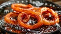 Perfectly crispy onion rings freshly fried to golden perfection in bubbling oil Royalty Free Stock Photo