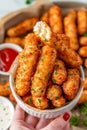 Perfectly fried mozzarella sticks with gooey cheese inside and a crispy golden coating