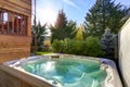 View of the back yard with hot tub for quiet relaxation. Royalty Free Stock Photo