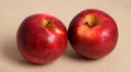 2 perfectly red and beautiful apples