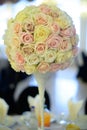 Perfectly round floral centerpiece featuring an exquisite pastel color roses bouquet Royalty Free Stock Photo