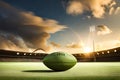 A perfectly set rugby ball on the tee, ready for a kickoff at the start of a thrilling match Royalty Free Stock Photo