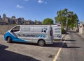 Perfectshine, a small Window Cleaning Company in Aberdeen with one of its Vans parked in Albert Lane, while its Operator does work